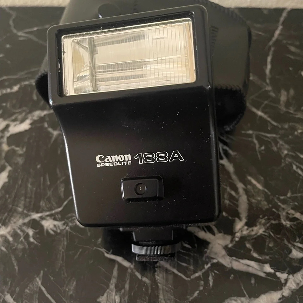 Canon AE-1 Black and Silver Film Camera with Flash 188A